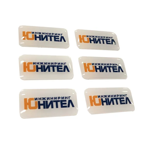 Наклейки с полимерной заливкой Юнител инжиниринг