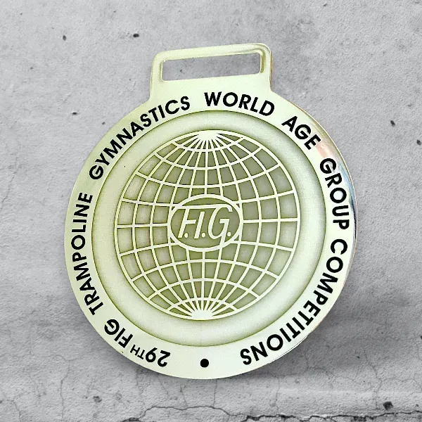 Медали на заказ с глубокой гравировкой и частичной заливкой краски