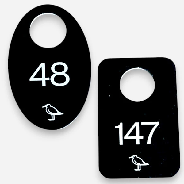 Изготовление металлических номерков для Новой Голандии