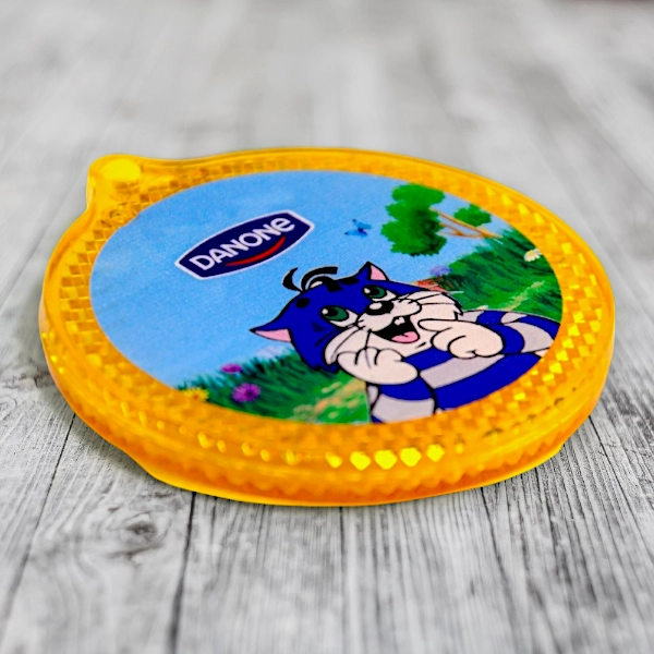 Нанесение логотипа компании DANON на светоотражателях