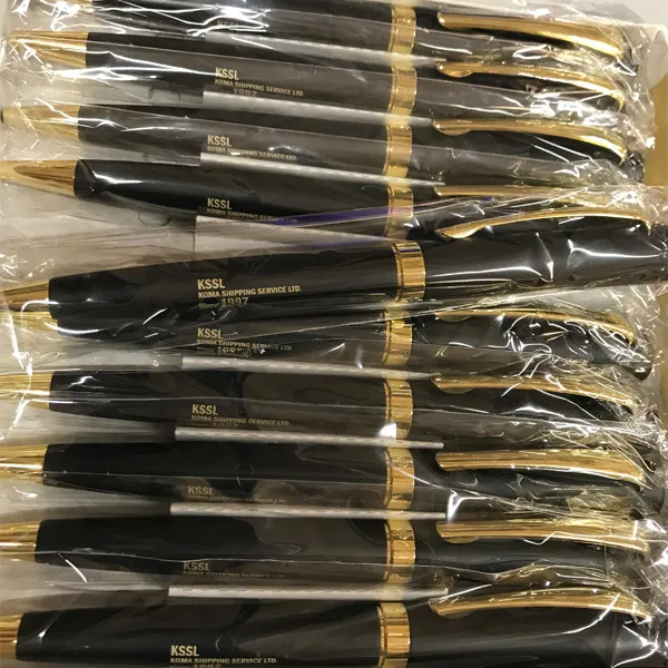 Логотип KSSL, лакированная поверхность, под ней латунь