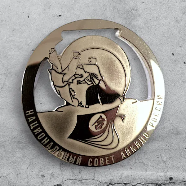 Полированная латунь 3 мм, сквозная резка+гравировка для Федерации айкидо РФ